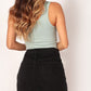 BEADED STUDS EMBELLISHED DISTRESSED MINI SKIRT